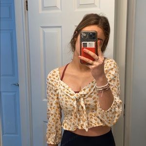 White ruffle tie top with yellow flowers